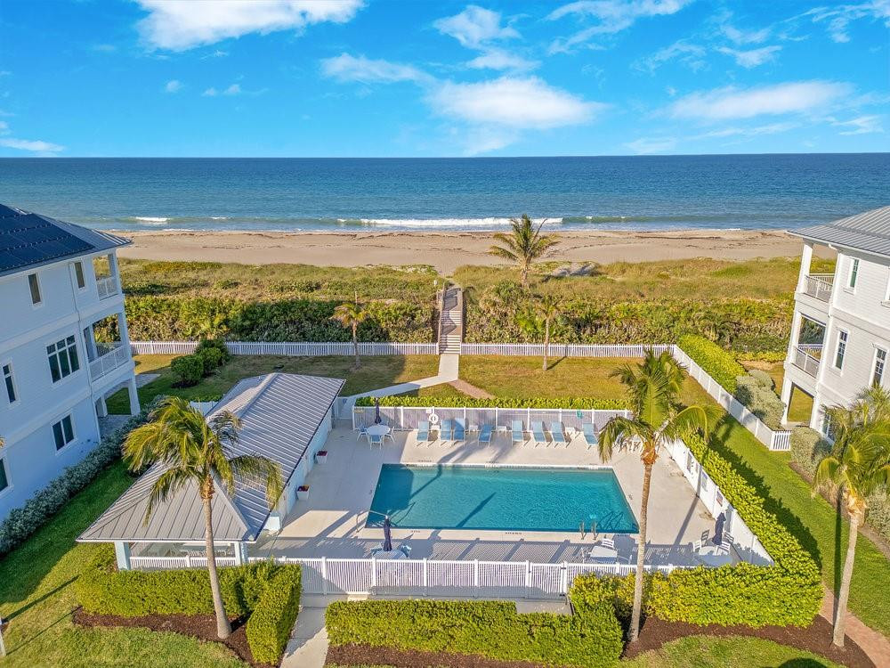 5104 Watersong Way Fort Pierce, FL 34949 - Photo 12 of 15 a view of a swimming pool with seating area