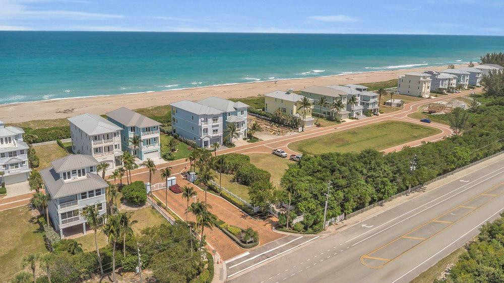 5104 Watersong Way Fort Pierce, FL 34949 - Photo 14 of 15 an aerial view of residential houses with outdoor space and river