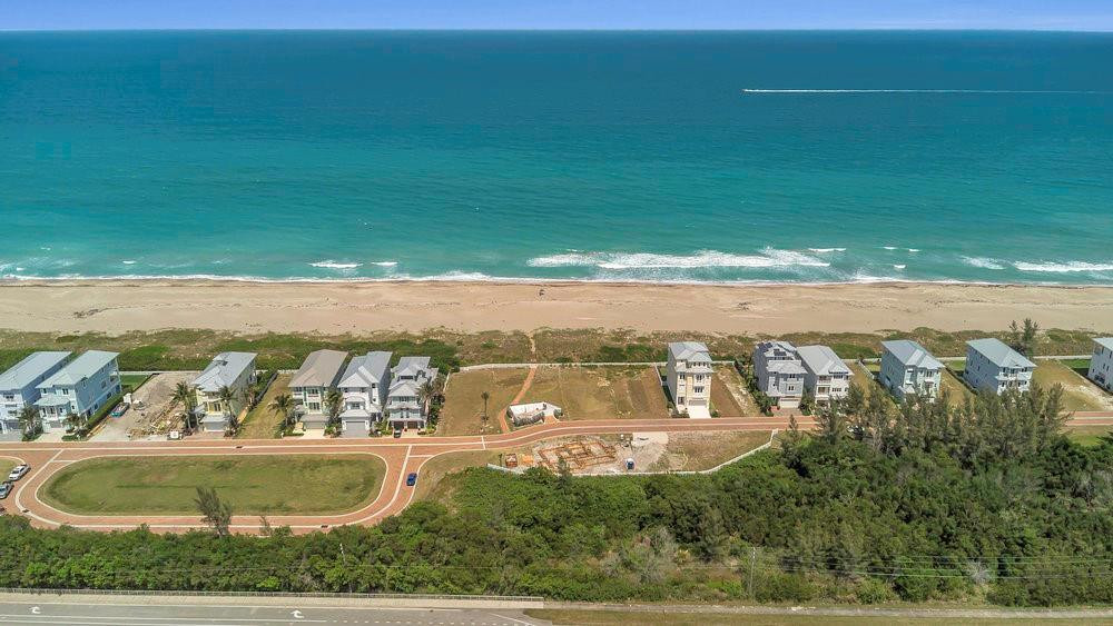 5104 Watersong Way Fort Pierce, FL 34949 - Photo 15 of 15 a view of a swimming pool with an ocean view