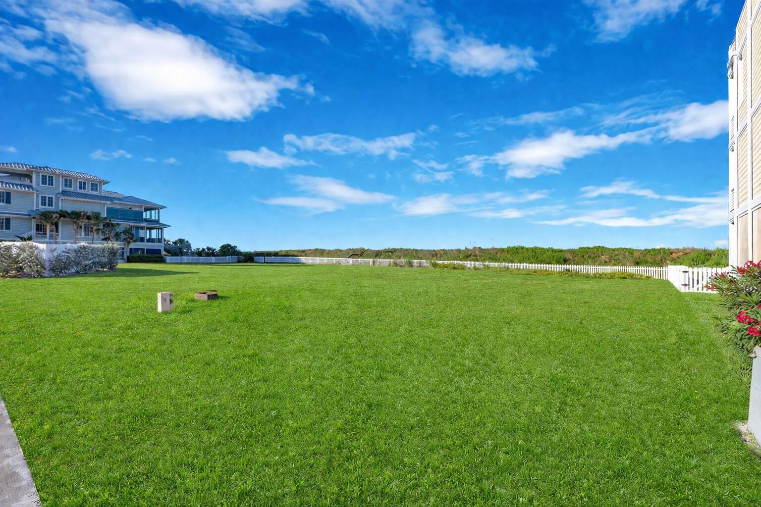 5104 Watersong Way Fort Pierce, FL 34949 - Photo 6 of 15 a view of a green field