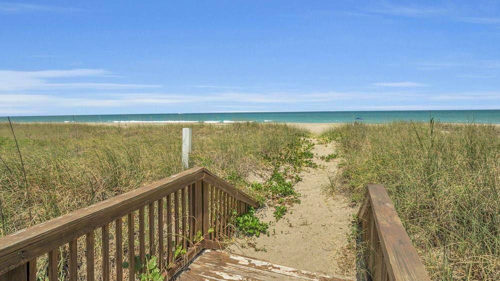 5104 Watersong Way Fort Pierce, FL 34949 - Photo 8 of 15 a view of a balcony next to a yard