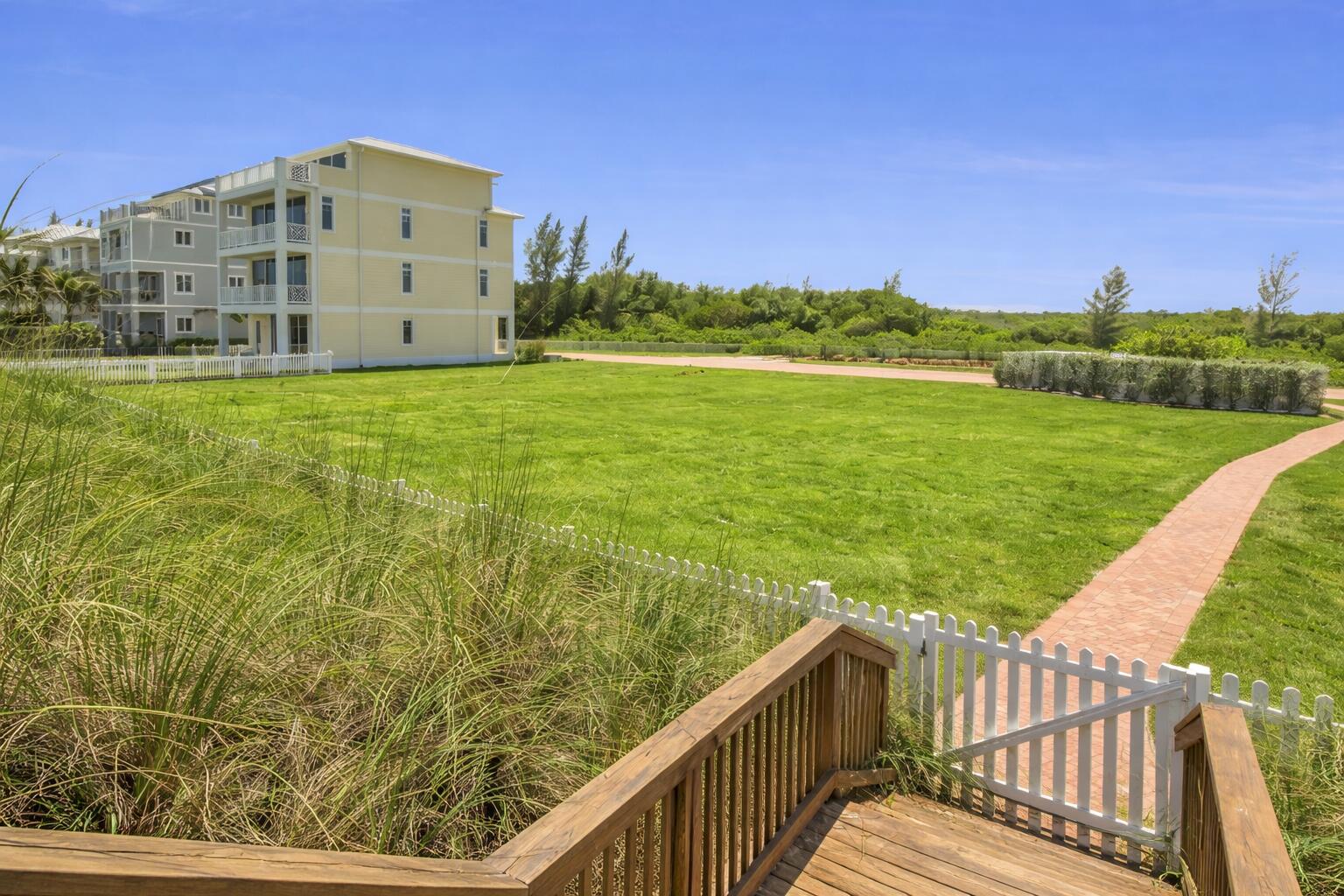 5104 Watersong Way Fort Pierce, FL 34949 - Photo 10 of 15 a view of a balcony with an outdoor space and seating area