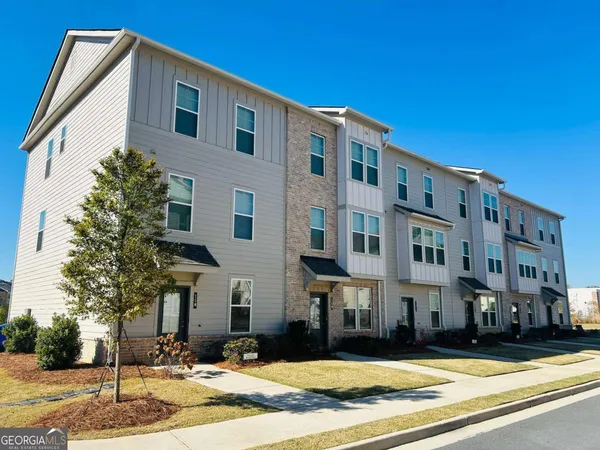 a front view of a building with street view