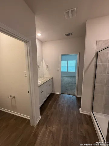 a bathroom with a toilet and a sink