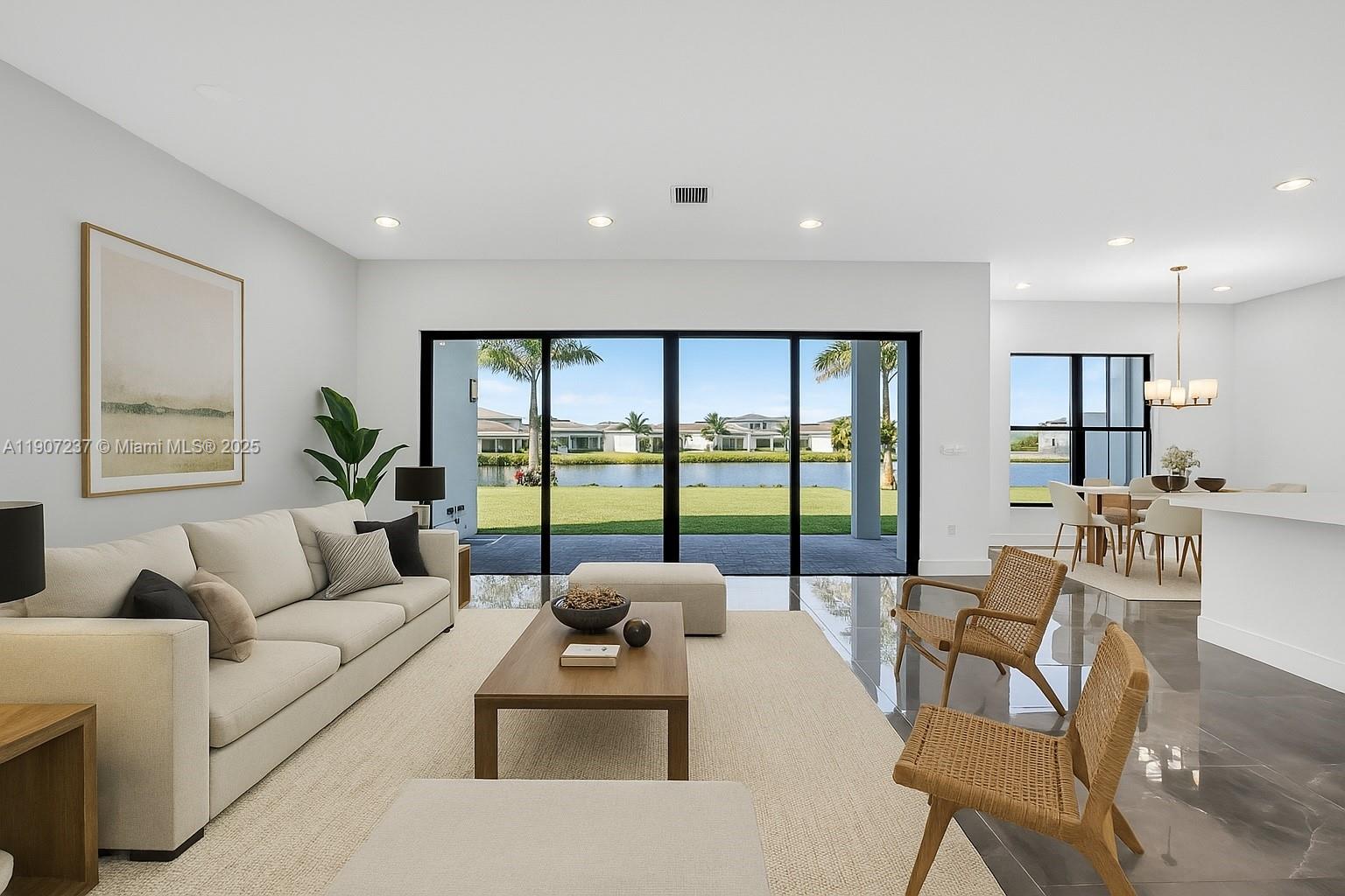 8215 Crystal Downs Avenue, Unit 8215 Boca Raton, FL 33434 - Photo 18 of 95 a living room with furniture and a large window