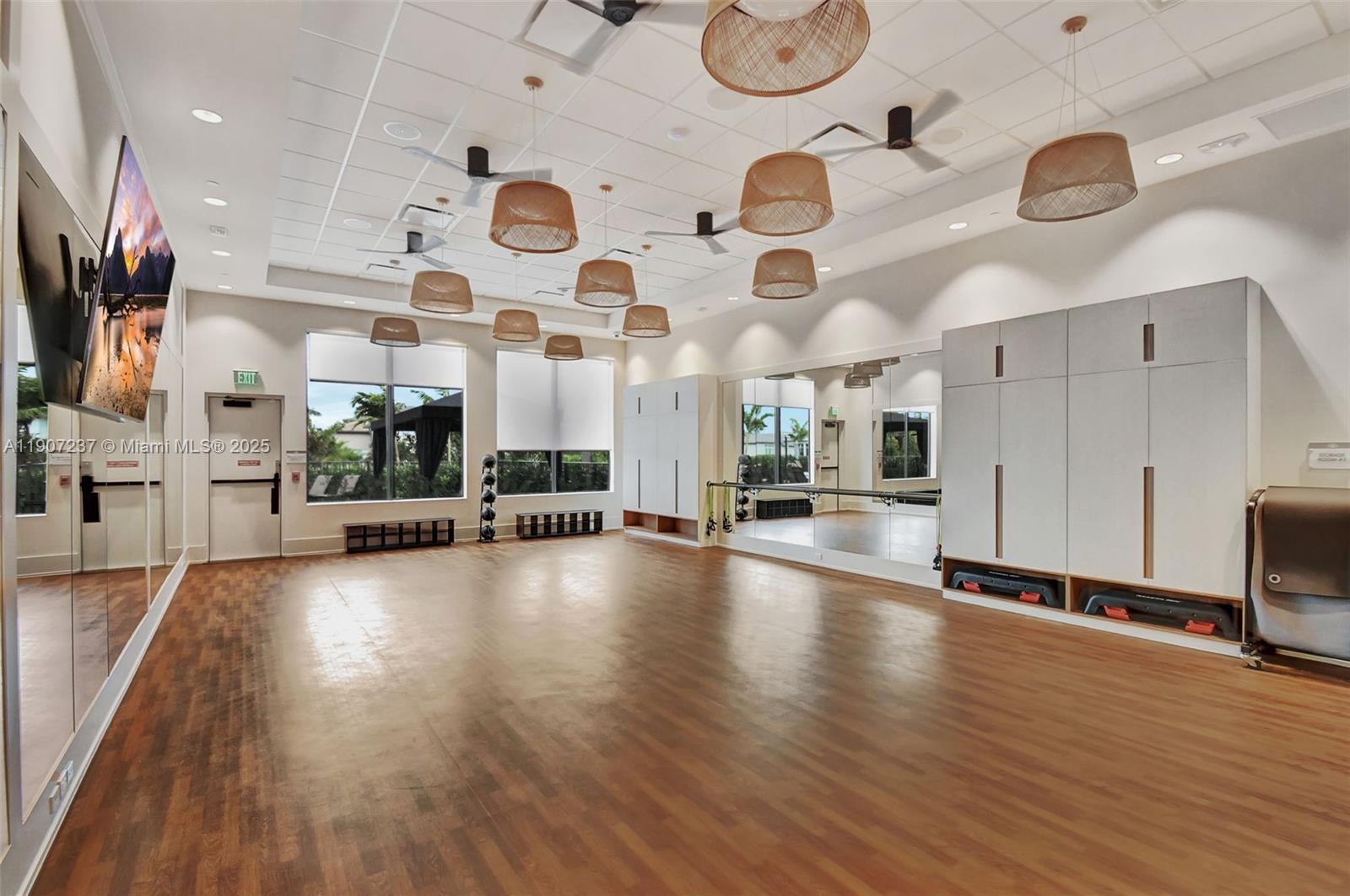 8215 Crystal Downs Avenue, Unit 8215 Boca Raton, FL 33434 - Photo 89 of 95 a view of a room with gym equipment