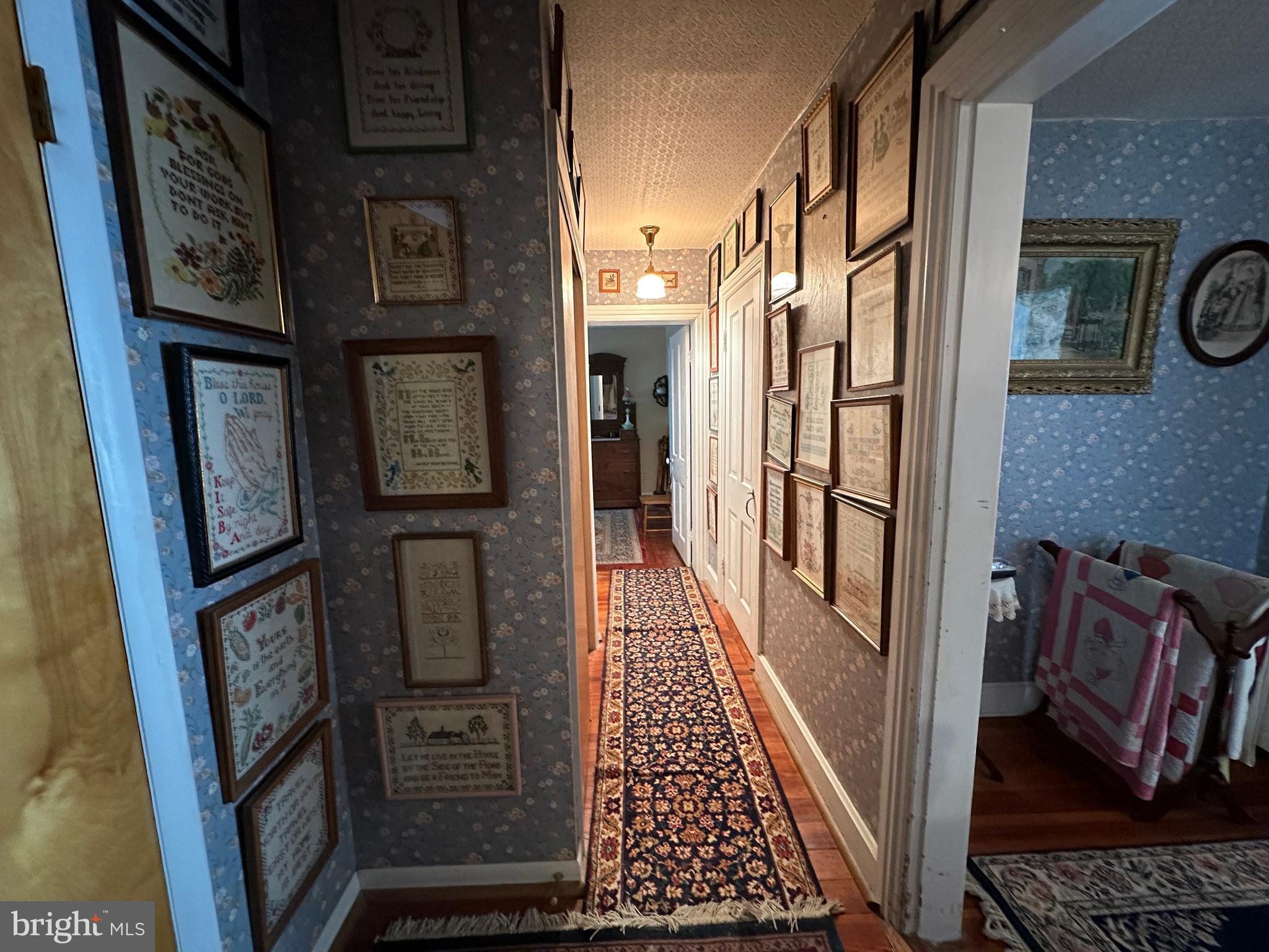 12429 Angle Drive Clear Spring, MD 21722 - Photo 105 of 129 a view of a hallway with wooden floor and staircase