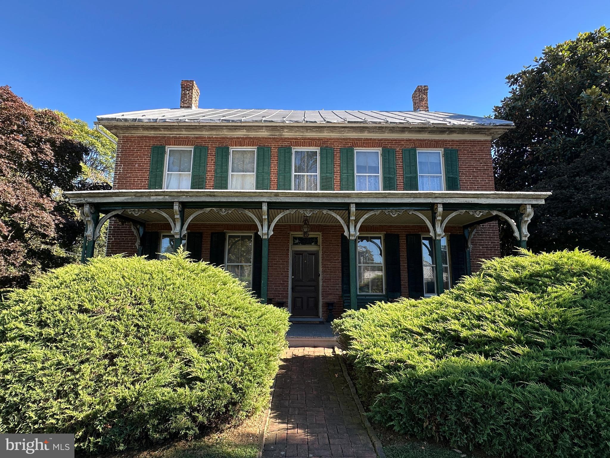 12429 Angle Drive Clear Spring, MD 21722 - Photo 2 of 129 a front view of a house with a garden
