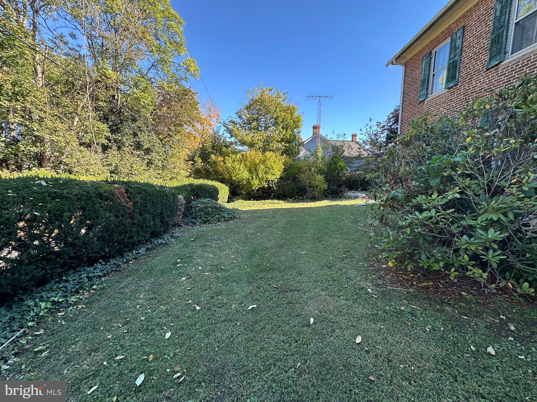 12429 Angle Drive Clear Spring, MD 21722 - Photo 24 of 129 a view of a garden with a building in the background