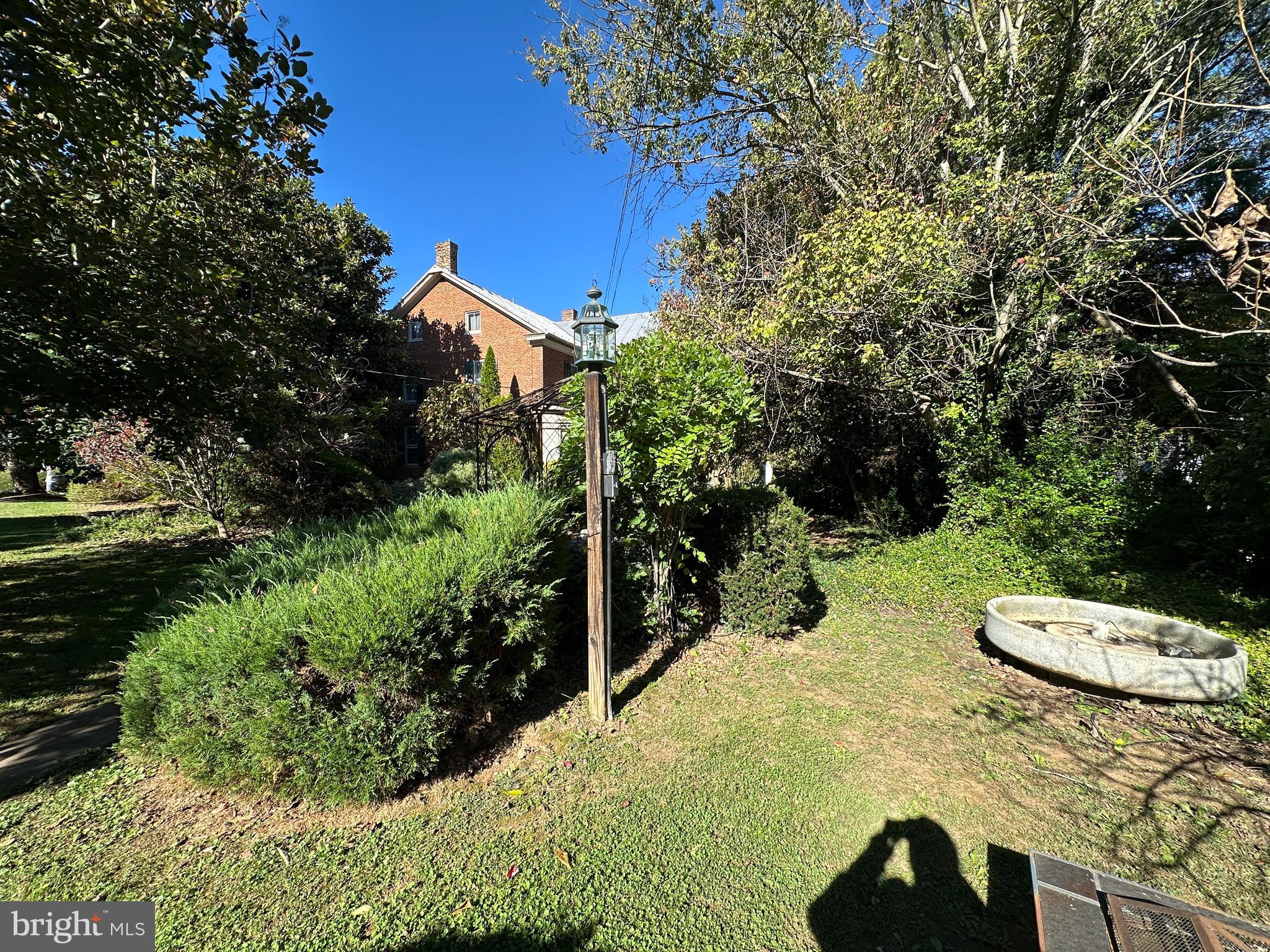 12429 Angle Drive Clear Spring, MD 21722 - Photo 34 of 129 a backyard of a house with a yard and outdoor seating
