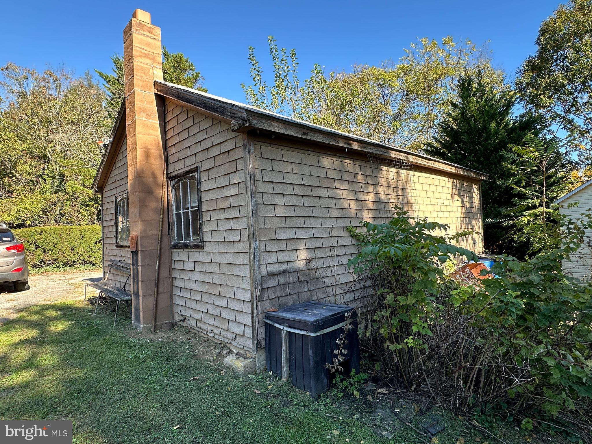 12429 Angle Drive Clear Spring, MD 21722 - Photo 40 of 129 a backyard of a house with plants and tree