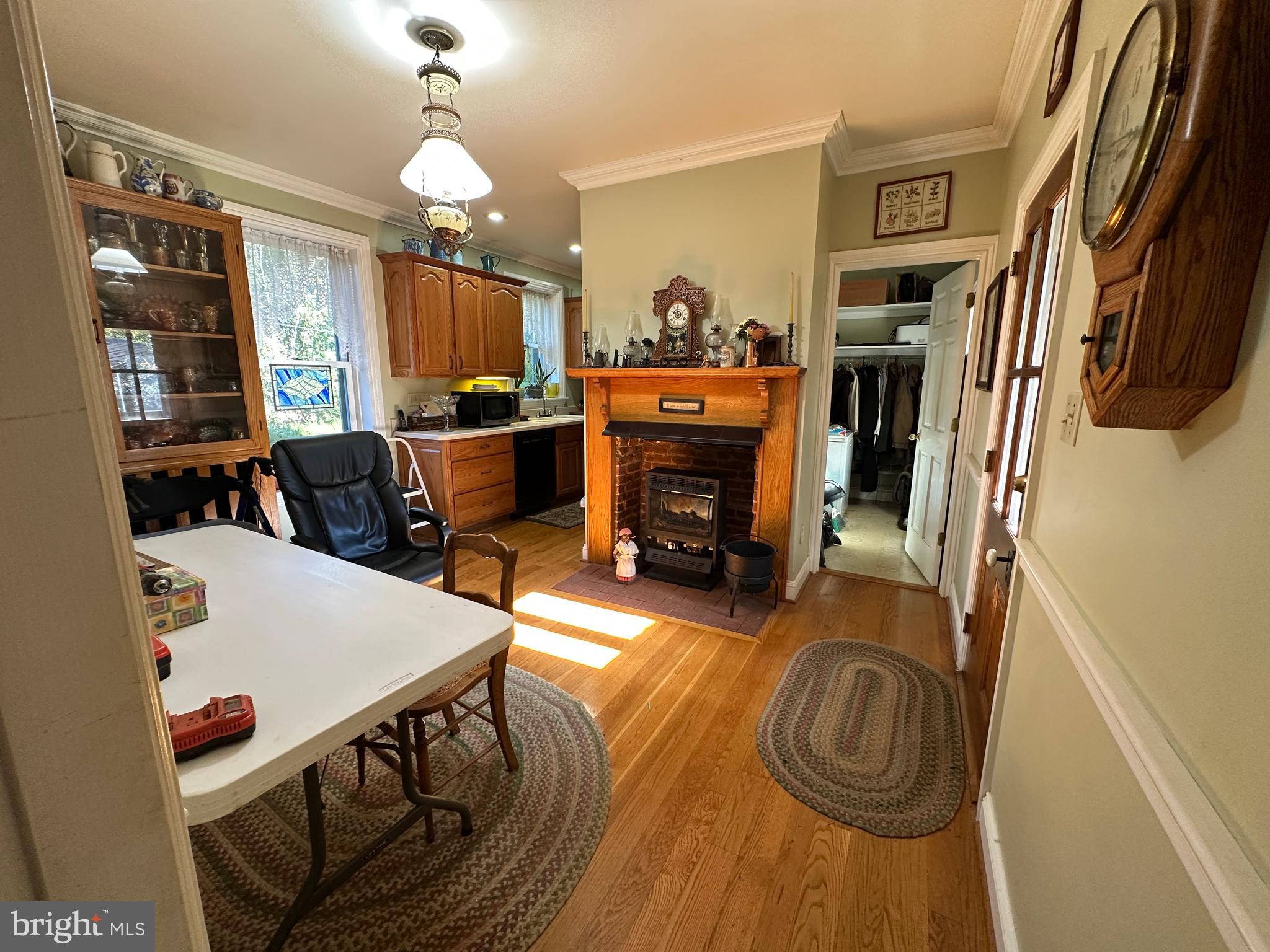 12429 Angle Drive Clear Spring, MD 21722 - Photo 55 of 129 a living room with furniture a fireplace and a flat screen tv