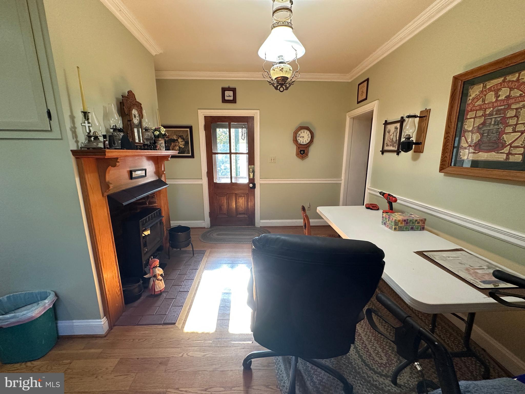 12429 Angle Drive Clear Spring, MD 21722 - Photo 57 of 129 a living room with furniture and a flat screen tv