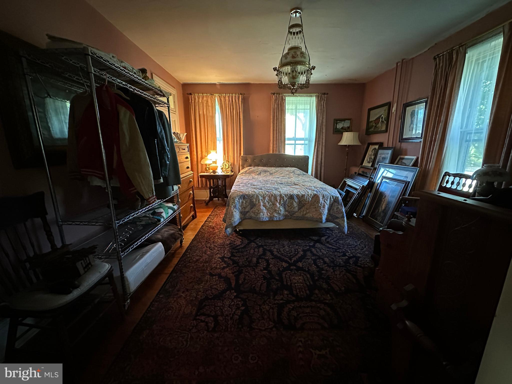 12429 Angle Drive Clear Spring, MD 21722 - Photo 70 of 129 a spacious bedroom with a bed closet and flat tv screen