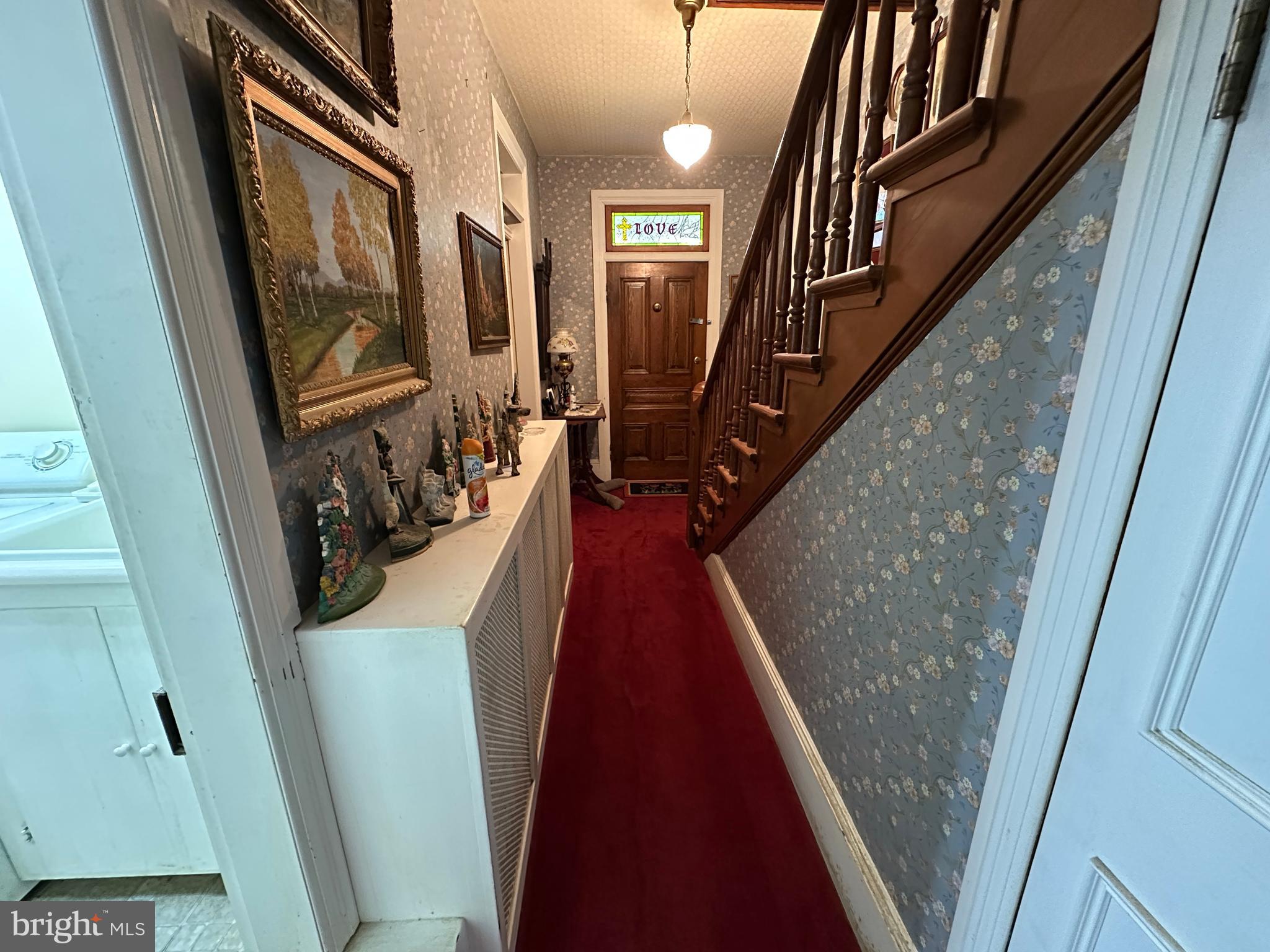 12429 Angle Drive Clear Spring, MD 21722 - Photo 83 of 129 a view of a hallway with wooden floor and stairs