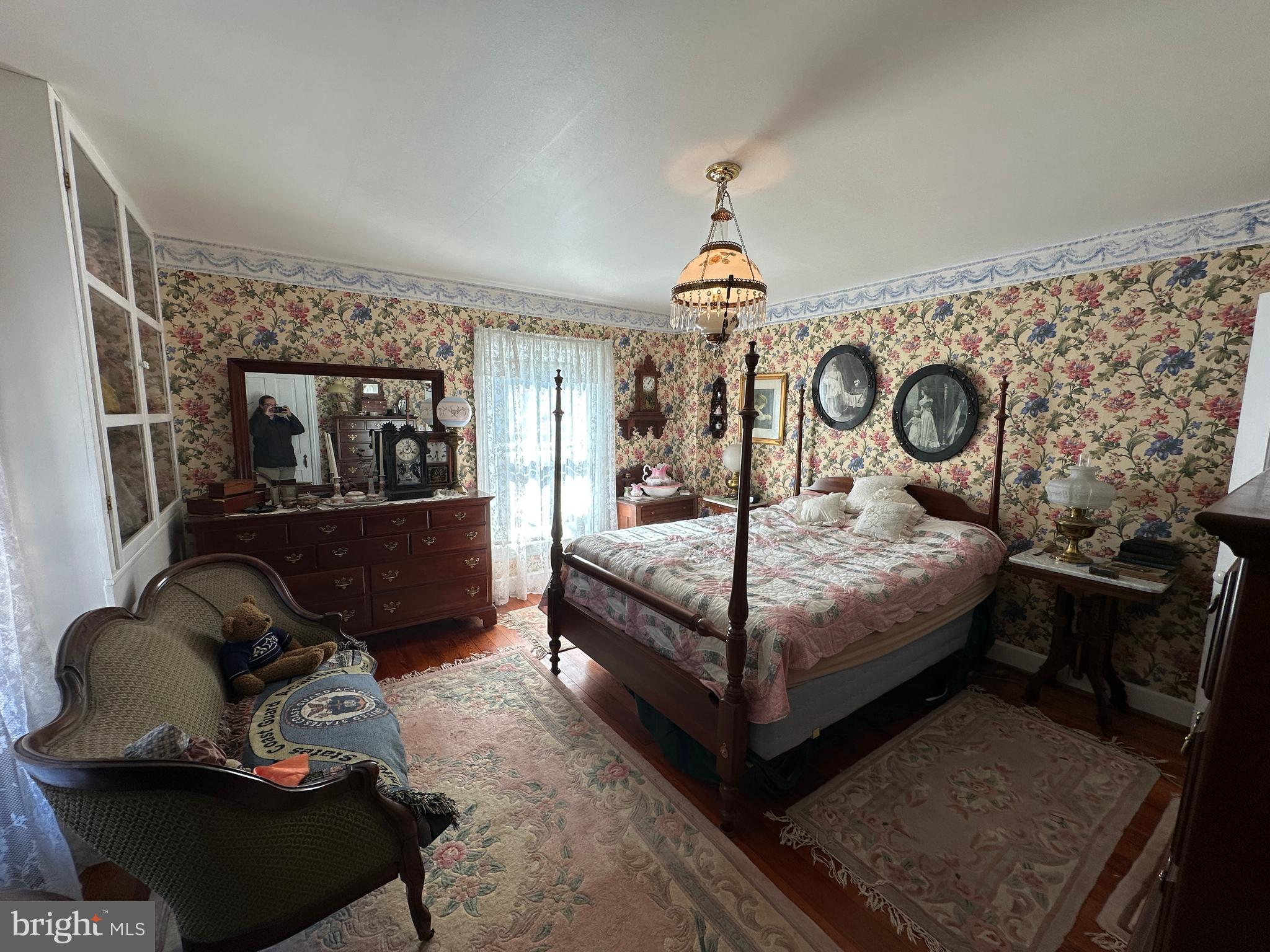 12429 Angle Drive Clear Spring, MD 21722 - Photo 91 of 129 a bedroom with a bed and wooden floor