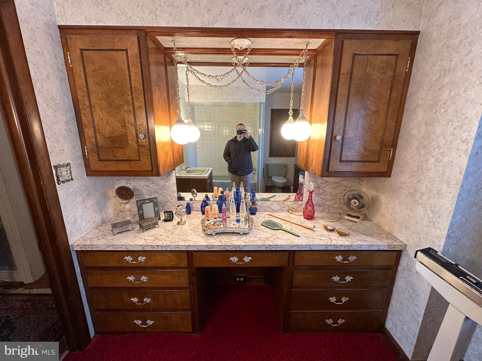 12429 Angle Drive Clear Spring, MD 21722 - Photo 100 of 129 a bathroom with a double vanity sink and a mirror
