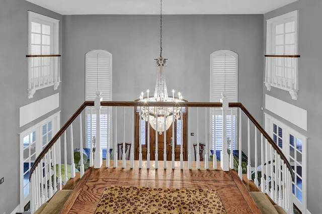 a spacious bathroom with a double vanity sink and a mirror