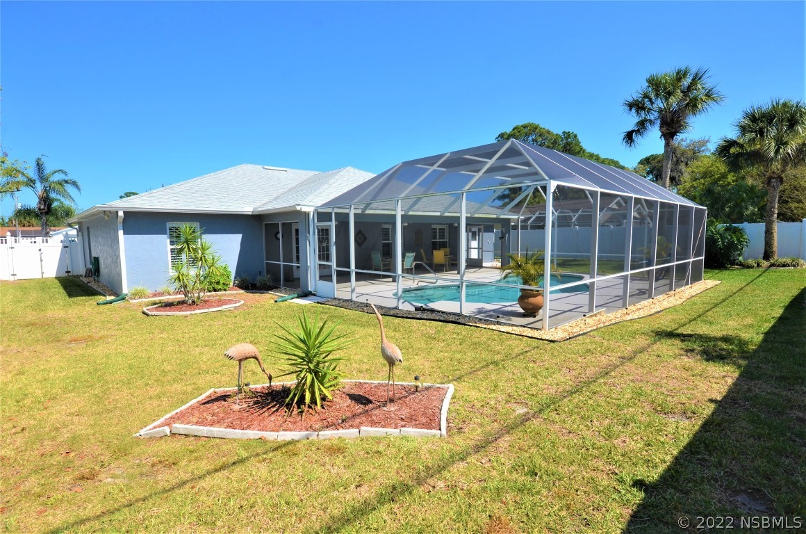 2924 Royal Palm Drive Edgewater, FL 32141 - Photo 11 of 43 a view of a house with swimming pool and porch with furniture