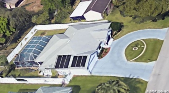 2924 Royal Palm Drive Edgewater, FL 32141 - Photo 2 of 43 an aerial view of a house swimming pool and a yard