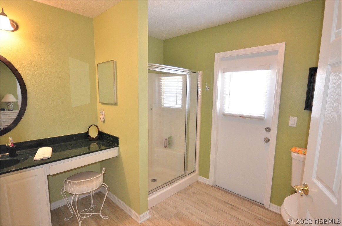 2924 Royal Palm Drive Edgewater, FL 32141 - Photo 35 of 43 a kitchen with a sink and a refrigerator