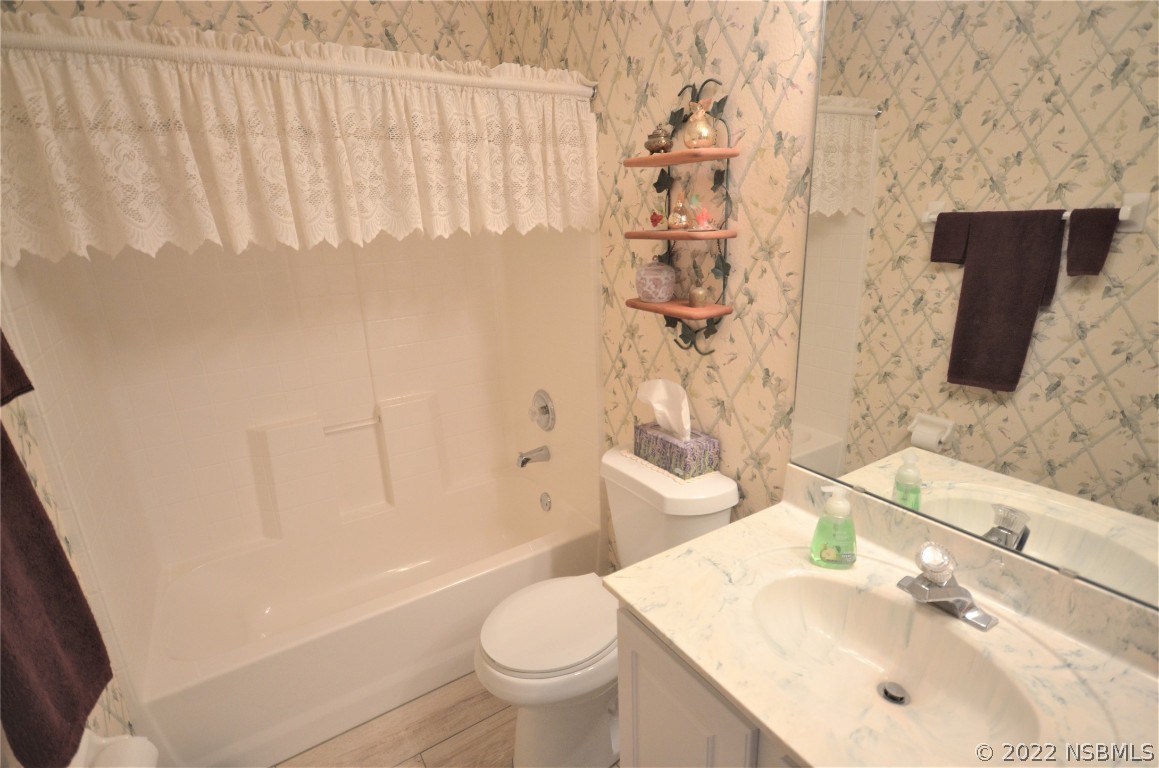 2924 Royal Palm Drive Edgewater, FL 32141 - Photo 40 of 43 a bathroom with a sink toilet and shower
