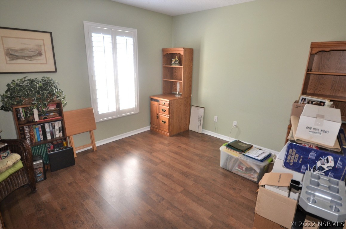 2924 Royal Palm Drive Edgewater, FL 32141 - Photo 42 of 43 a living room with furniture and wooden floor