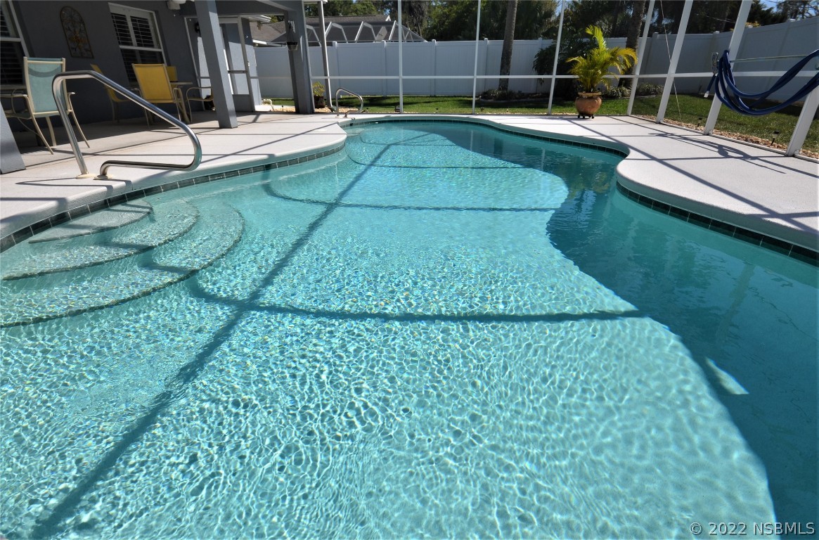 2924 Royal Palm Drive Edgewater, FL 32141 - Photo 9 of 43 a view of a backyard with swimming pool