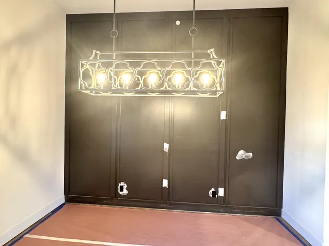 a view of a house with a snow in the yard