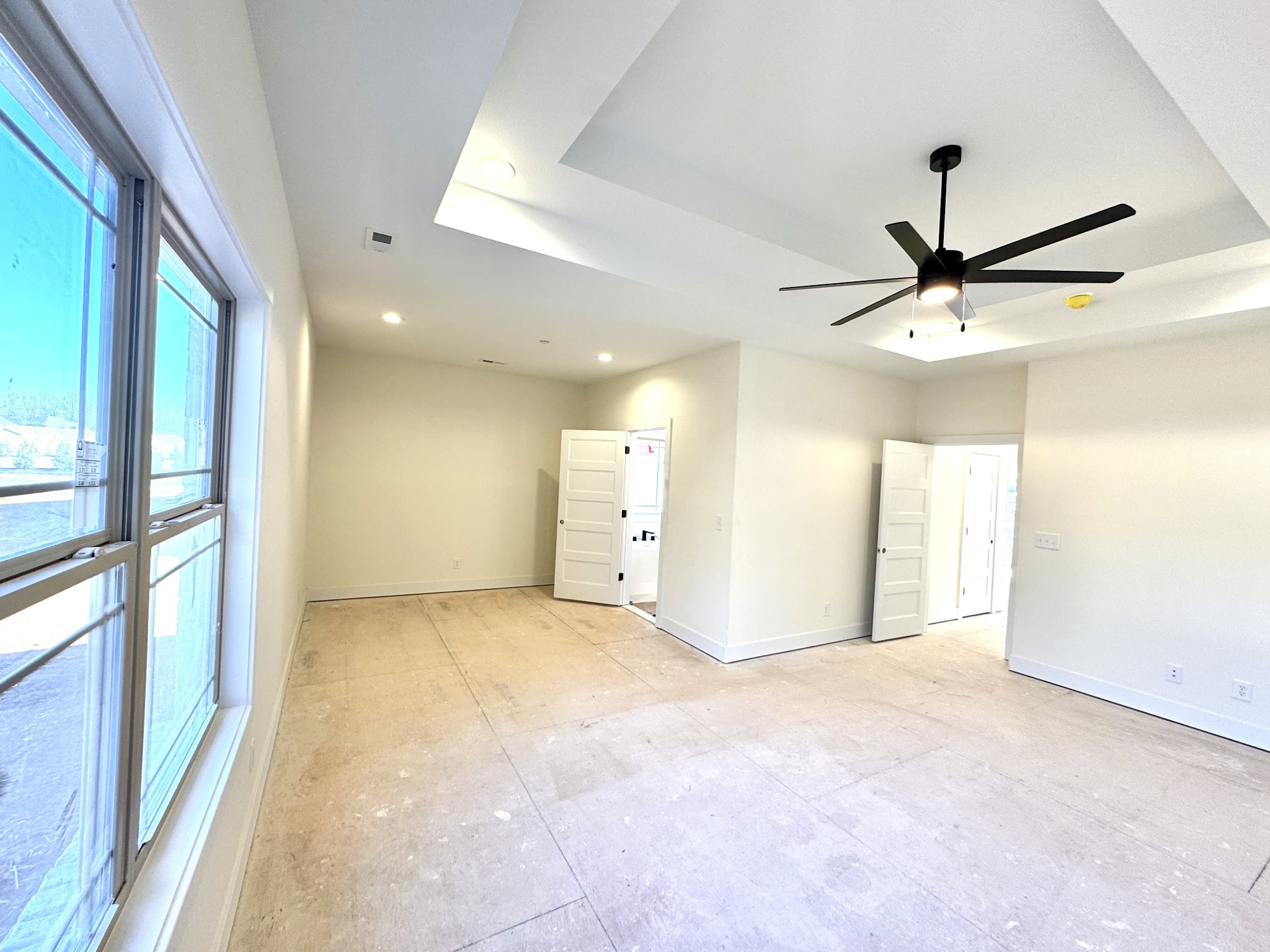 390 Young Lane Pleasant View, TN 37146 - Photo 21 of 48 a view of a livingroom with a ceiling fan and window