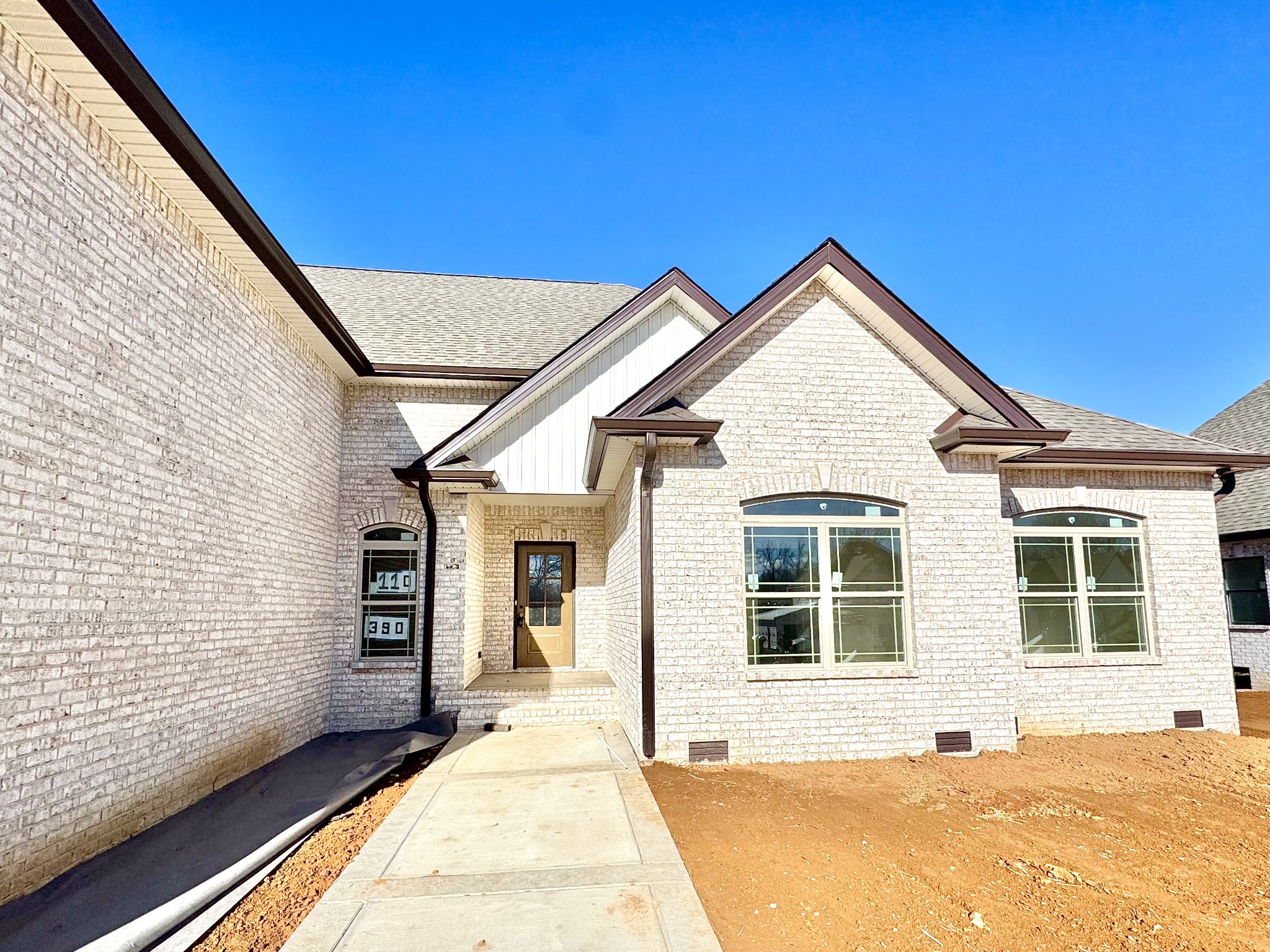 390 Young Lane Pleasant View, TN 37146 - Photo 4 of 48 a view of house with backyard and windows