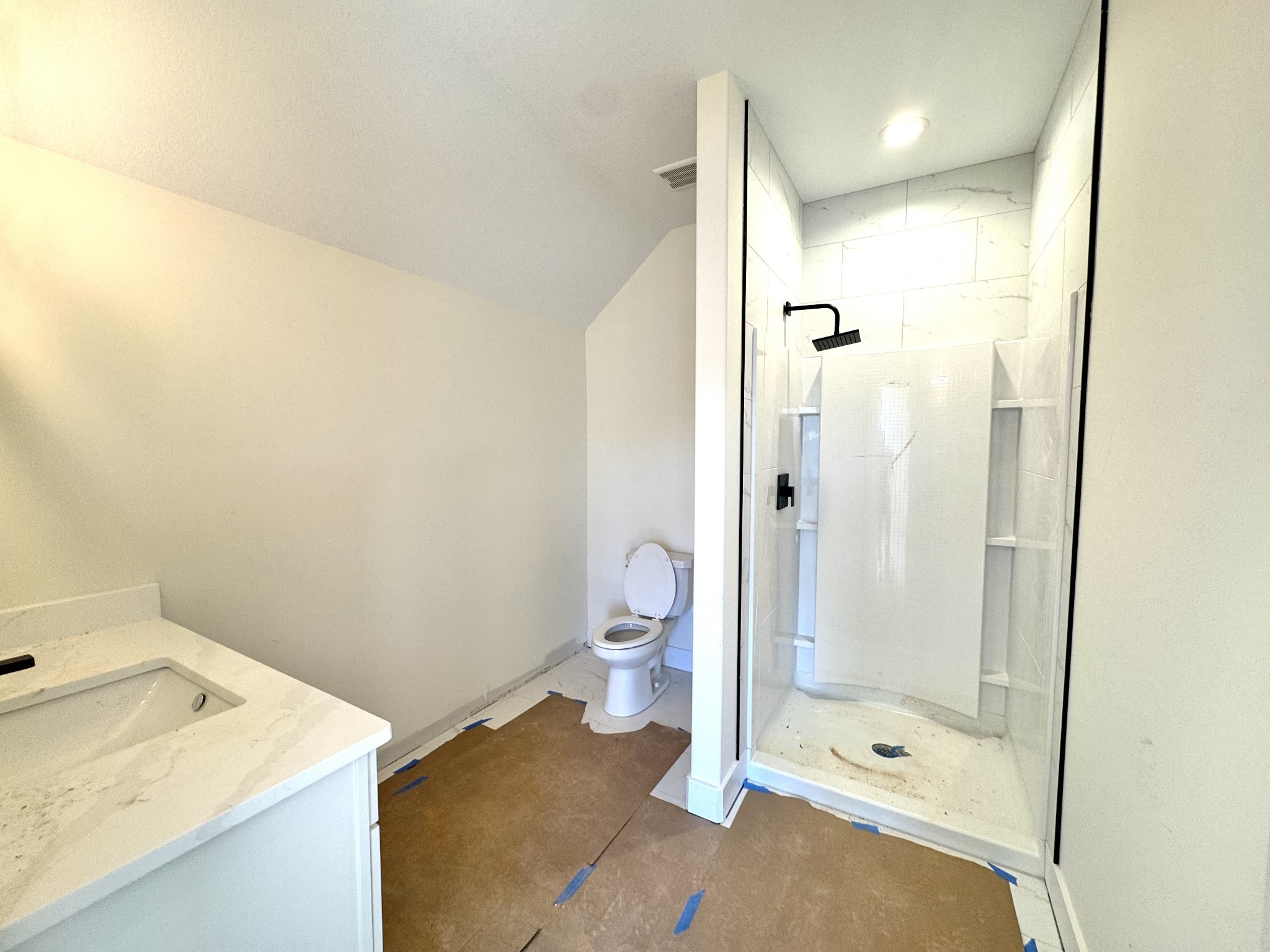 390 Young Lane Pleasant View, TN 37146 - Photo 41 of 48 a bathroom with a sink a toilet and shower