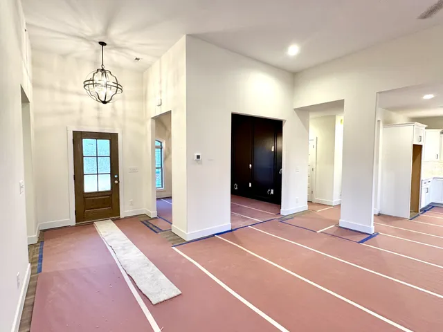 a bathroom with a double vanity sink a mirror and a shower