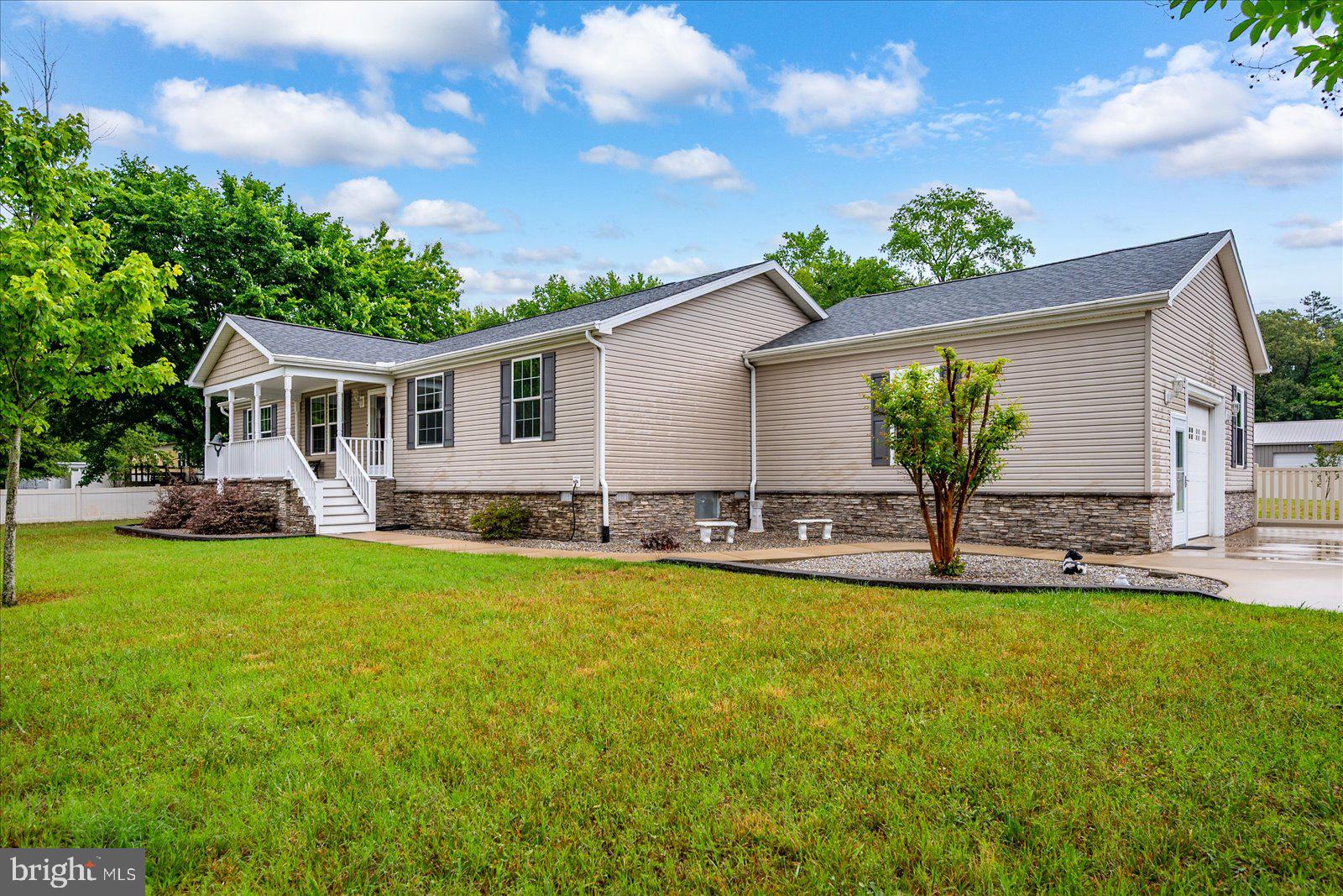 8225 Whitesville Road Pittsville, MD 21850 - Photo 2 of 45 a view of a house with a yard patio and swimming pool