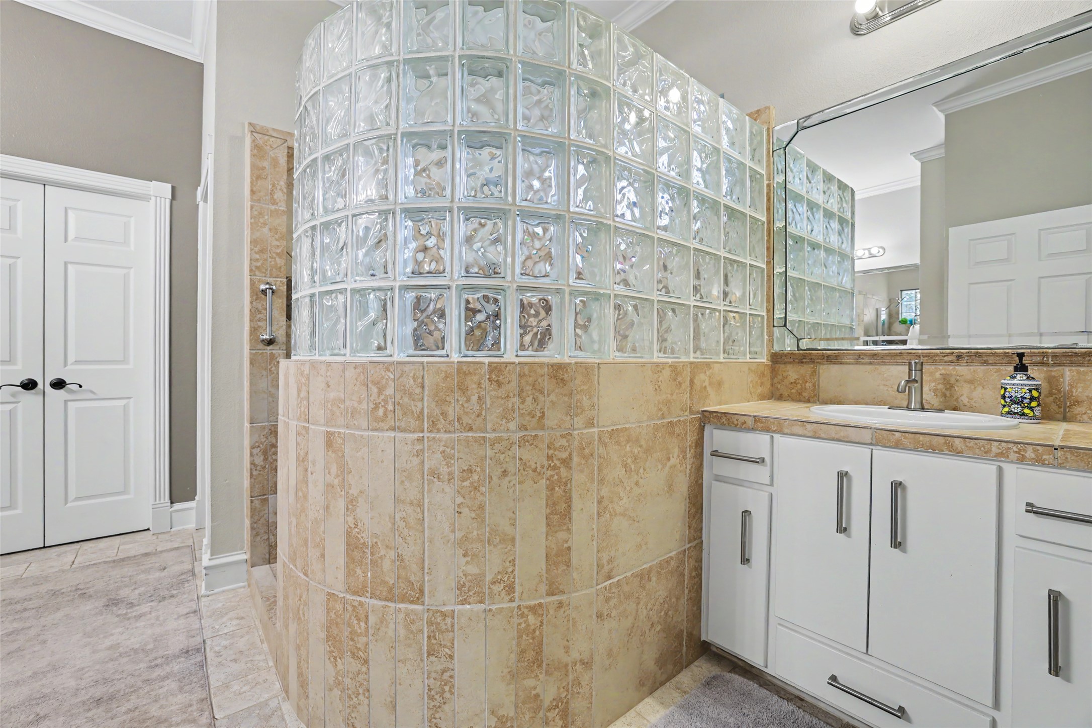 805 Boquilla Trail Georgetown, TX 78633 - Photo 23 of 40 a bathroom with a sink and a mirror