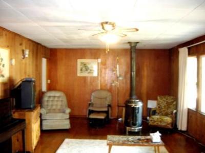 112 Duncan Ranch Road Hayfork, CA 96041 - Photo 3 of 20 a living room with furniture and a flat screen tv