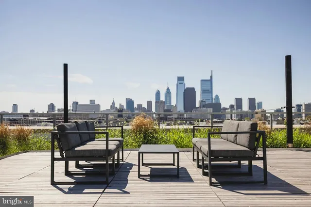 a view of roof deck with patio