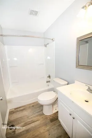 a view of a room that has a window in it
