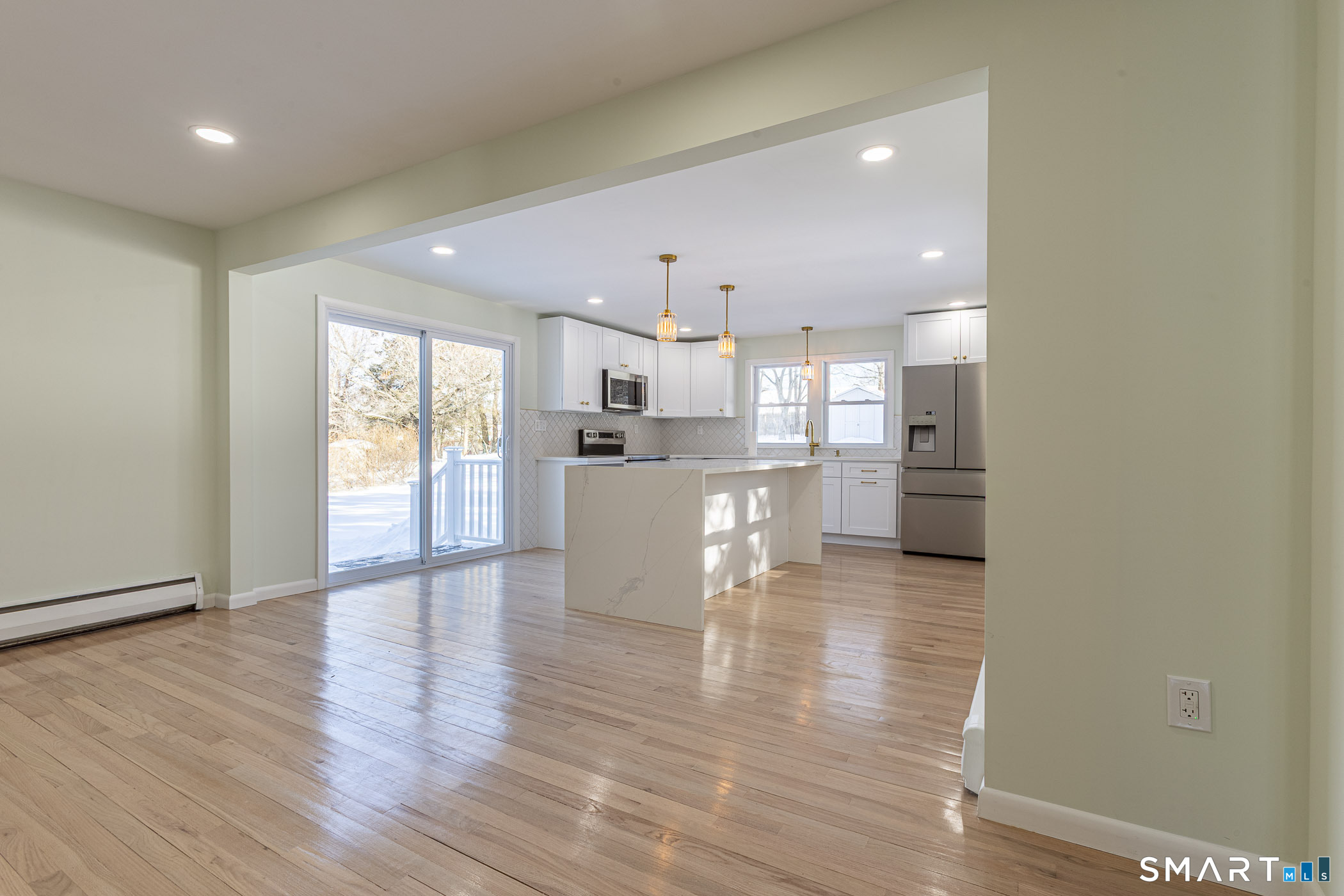 26 Kelly Road Hamden, CT 06518 - Photo 11 of 37 a view of a kitchen with wooden floor