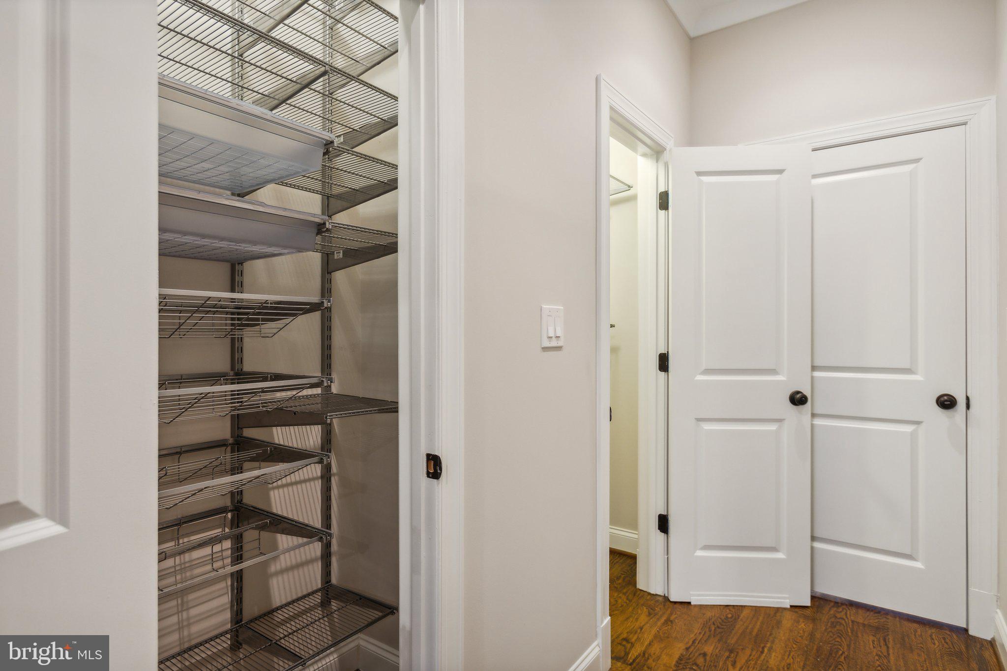 39 U Street Northeast, Unit 1 Washington, DC 20002 - Photo 9 of 22 a view of walk in closet with empty racks