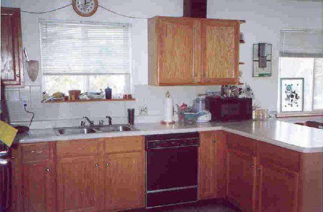 1553 Arabian Avenue Rifle, CO 81650 - Photo 3 of 4 a kitchen with sink and cabinets