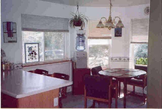 1553 Arabian Avenue Rifle, CO 81650 - Photo 4 of 4 a view of a dining room with furniture window and outside view