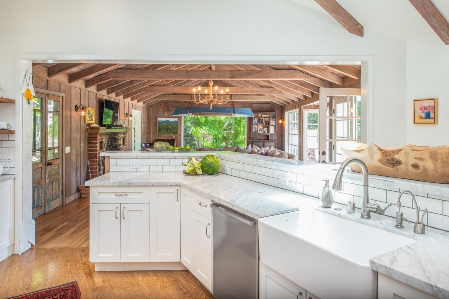 8990 West Carmel Valley Road Carmel Valley, CA 93923 - Photo 16 of 50 a kitchen with a sink and cabinets