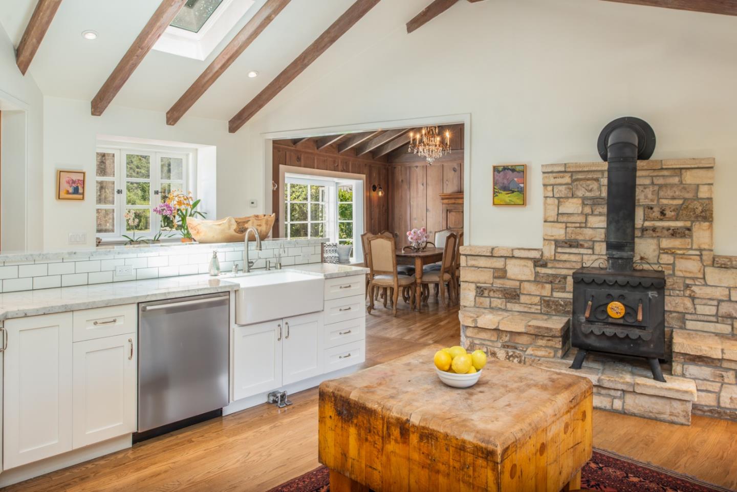 8990 West Carmel Valley Road Carmel Valley, CA 93923 - Photo 18 of 50 a kitchen with a sink and cabinets