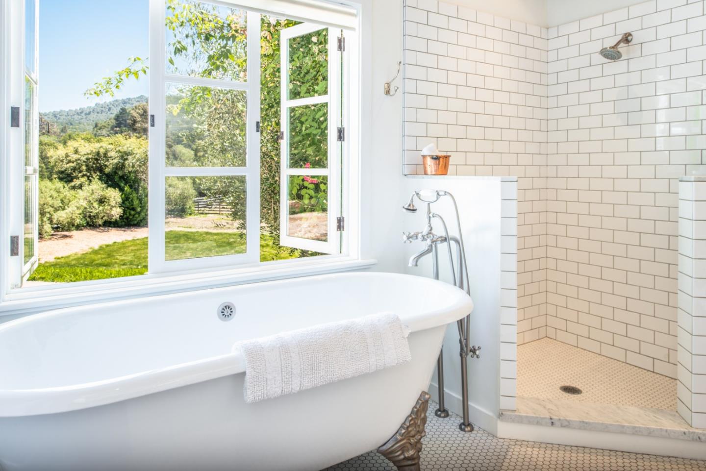 8990 West Carmel Valley Road Carmel Valley, CA 93923 - Photo 23 of 50 a bathroom with a sink and a bathtub