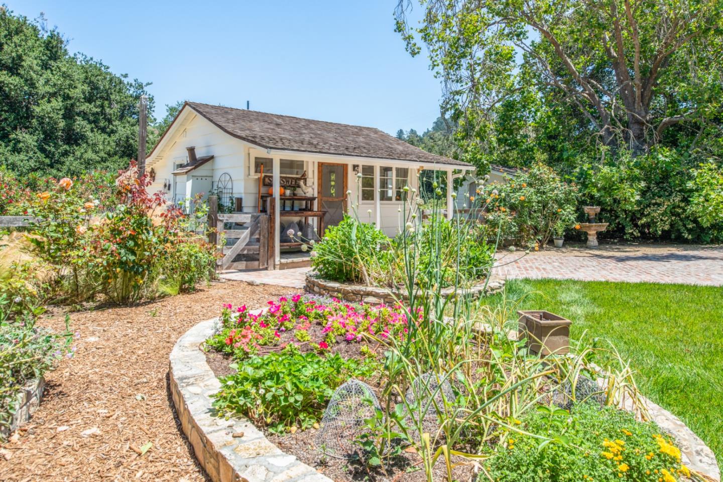 8990 West Carmel Valley Road Carmel Valley, CA 93923 - Photo 28 of 50 front view of a house with a yard