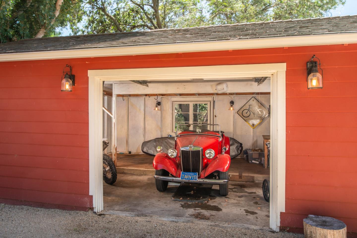8990 West Carmel Valley Road Carmel Valley, CA 93923 - Photo 34 of 50 a front view of a house with porch