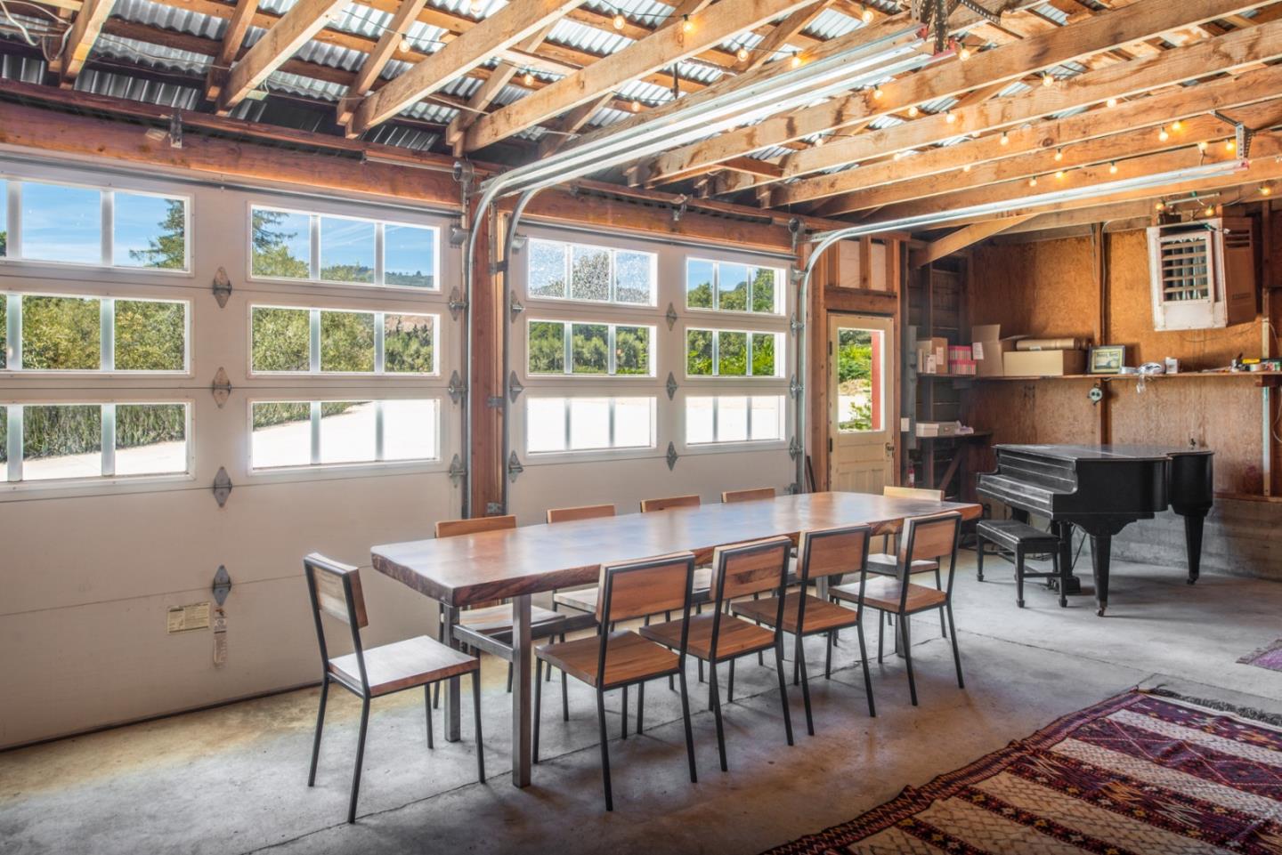 8990 West Carmel Valley Road Carmel Valley, CA 93923 - Photo 37 of 50 a view of a dining room with furniture window and outside view