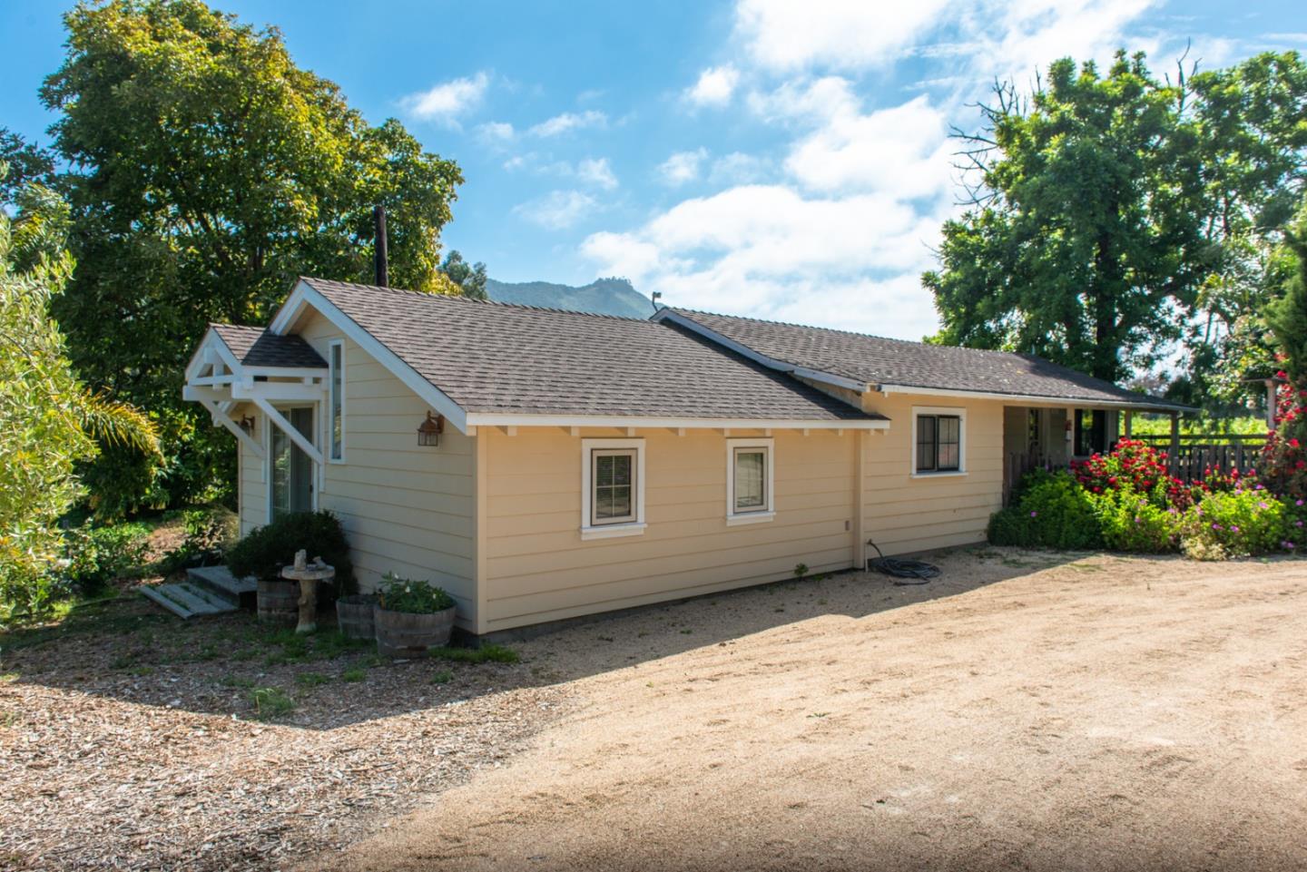 8990 West Carmel Valley Road Carmel Valley, CA 93923 - Photo 43 of 50 a view of a house with a yard