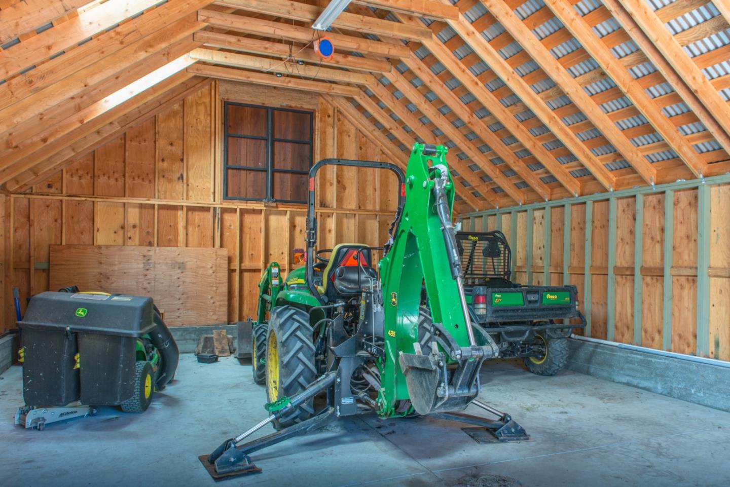 8990 West Carmel Valley Road Carmel Valley, CA 93923 - Photo 46 of 50 a backyard of a house with plants and outdoor seating